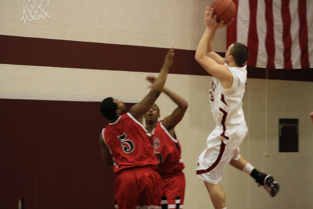 Mustangs Defeat Ravens 71-53