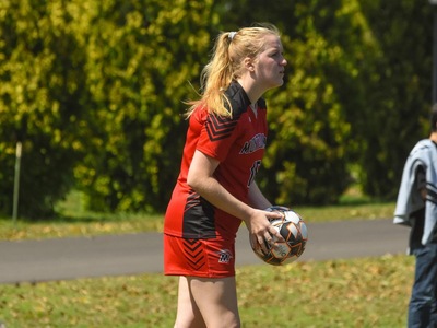 Mustangs Fall to Bucks in High-Scoring Affair